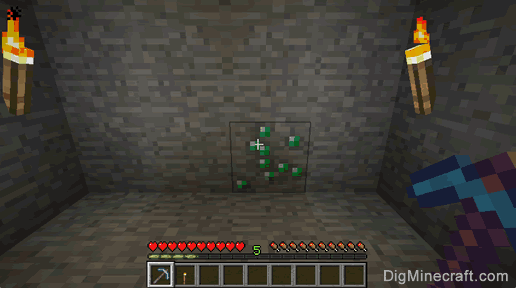 emerald ore and pickaxe